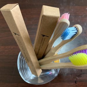 bamboo toothbrushes in bottle